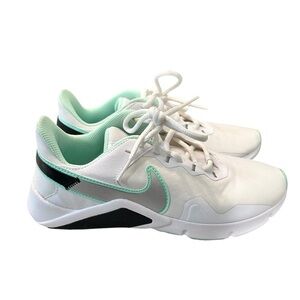 Nike Legend Essential 2 women’s size 7 white with black and mint green